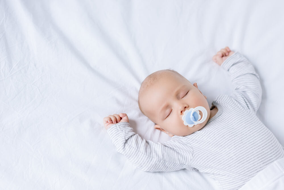 baby using a pacifier