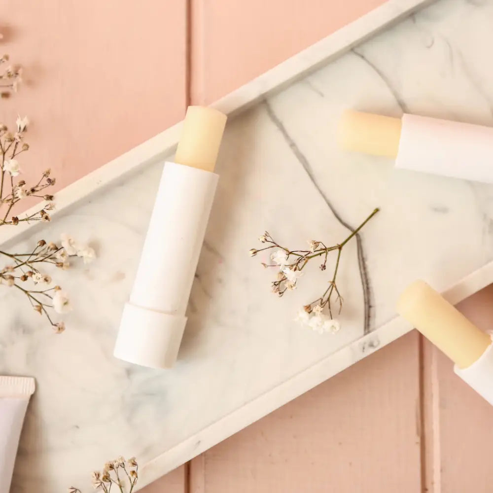 Free Gift 🌿 - LIP BALM - Apothecary This from the United States features white cylindrical tubes containing pale yellow