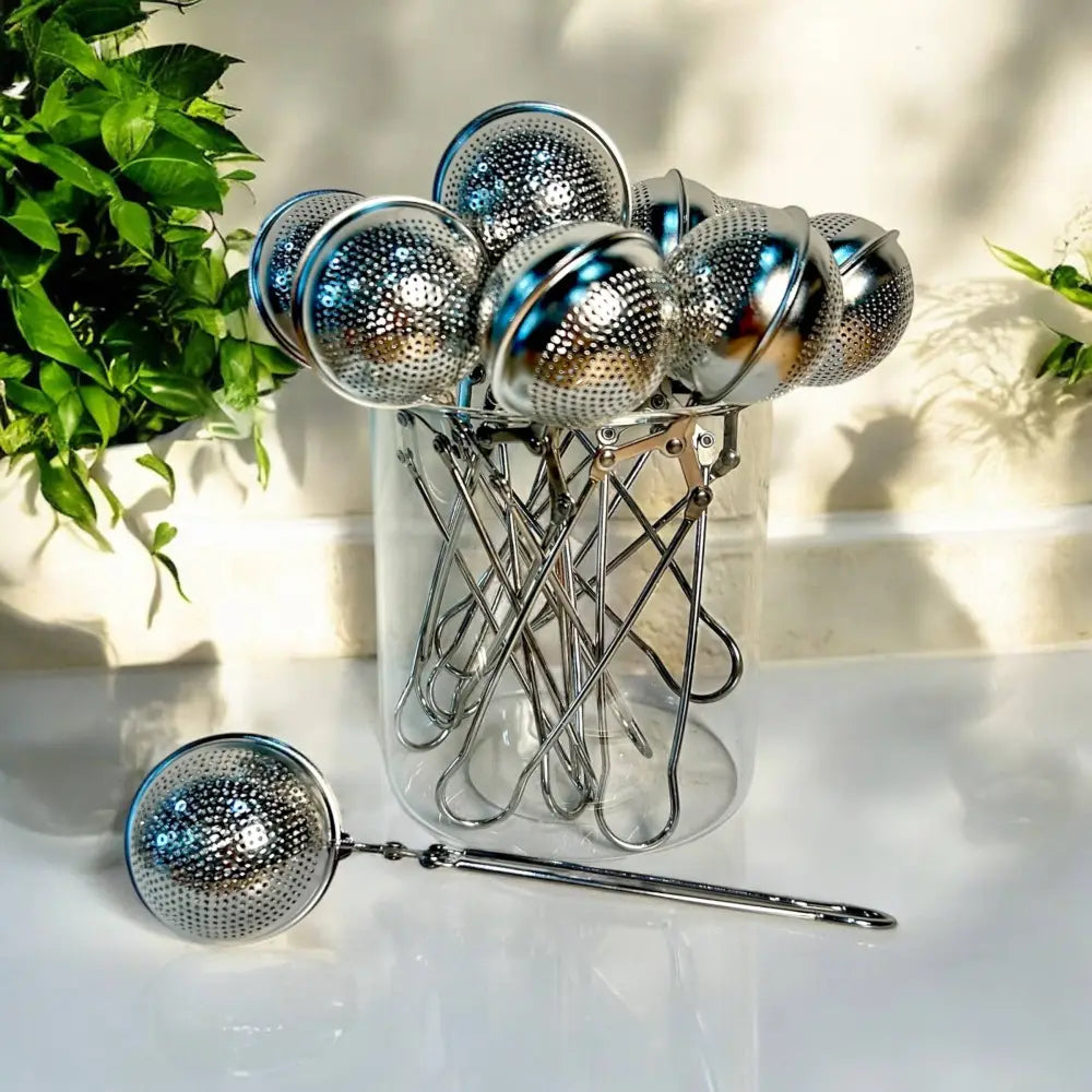 Stainless Steel Tea Steeper - Apothecary This stainless steel tea steeper features perforated mesh balls and long
