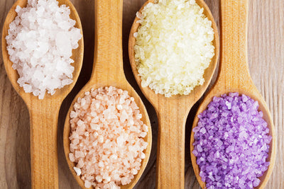 8 Benefits of Bath Salts + Which Ones to Try