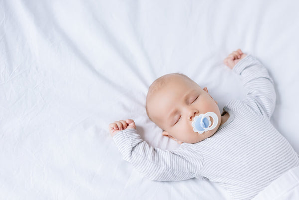baby using a pacifier